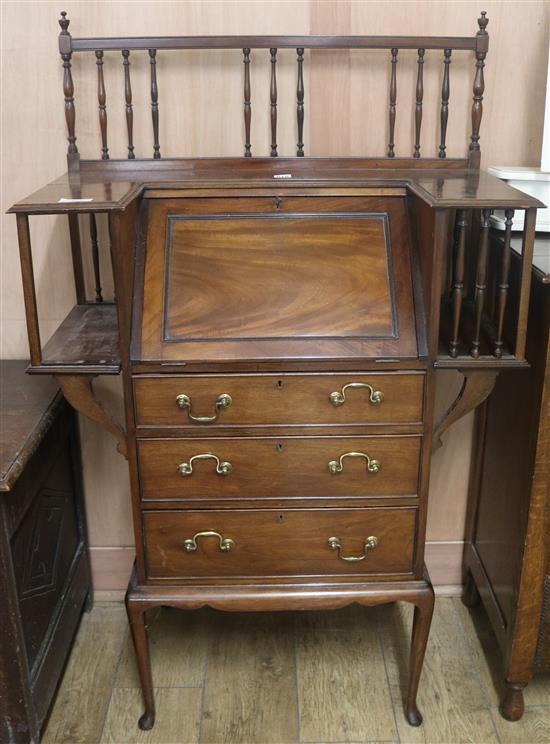 An Edwardian walnut students bureau, W.84cm